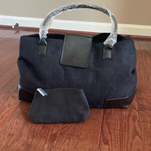 Black sued woman handbag